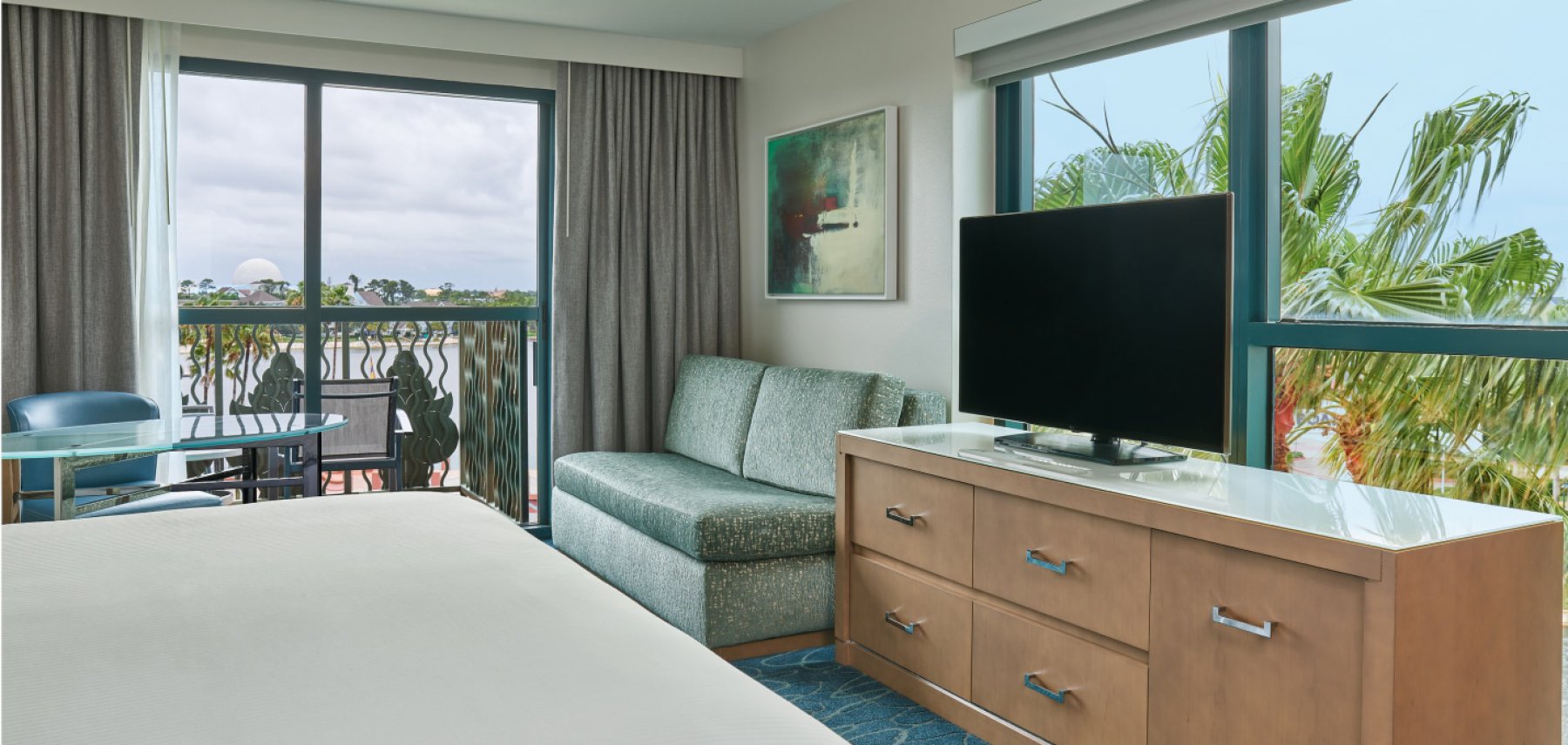 Dolphin Deluxe King With Couch, Desk, Chair, Large TV and Balcony